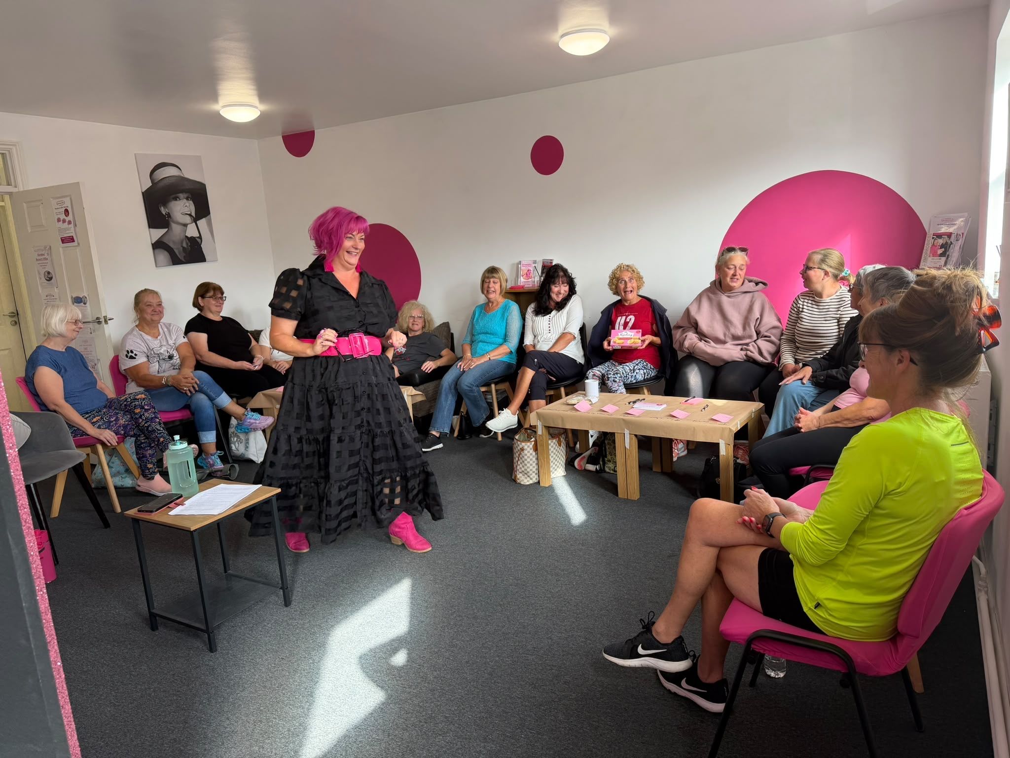 Belinda Warburton speaking with women at a Gymophobics Clacton coffee morning.